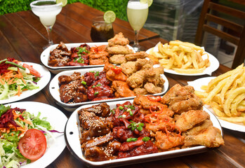 Chicken wings with BBQ sauce, broaster, buffalo, traditional Peruvian spice