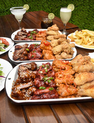 Chicken wings with BBQ sauce, broaster, buffalo, traditional Peruvian spice