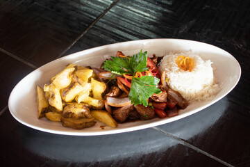Typical food of Peruvian food, lomo saltado, anticuchos, ceviche, chaufa rice
