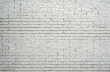 facade view of old white brick wall background