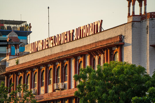 Dusk shot of Jaipur Development Authority building in pink sandstone showing a landmark