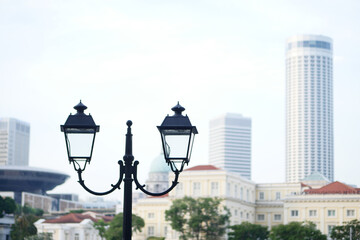 Fototapeta na wymiar Elegant street lamp surrounded at city 