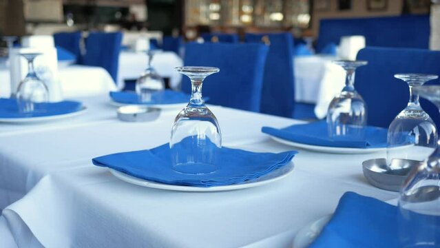 served and decorated round festive table in a restaurant 