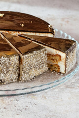 Delicious cheesecake with chocolate icing.