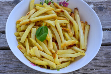  Home made   organic   Fresh fried French fries on wooden background