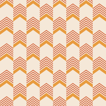 Abstract geometric seamless pattern with arrows. Arrows color vector ethnic pattern. Chevron pattern. Orange, yellow, beige colors. Color vector background.