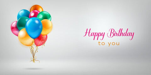 Festive birthday illustration with a bunch of colored helium balloons and inscription Happy Birthday to you on white background