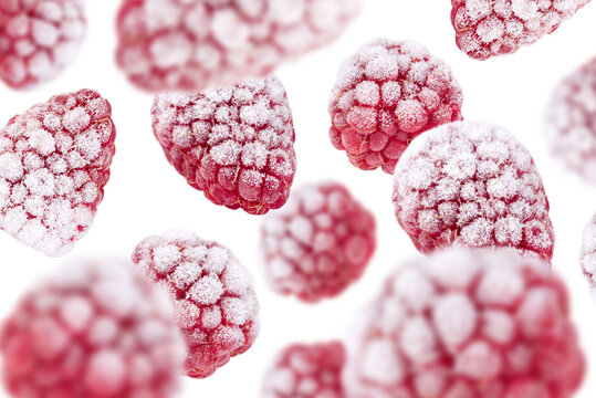 Levitation of frozen raspberries isolated on transparent background.
