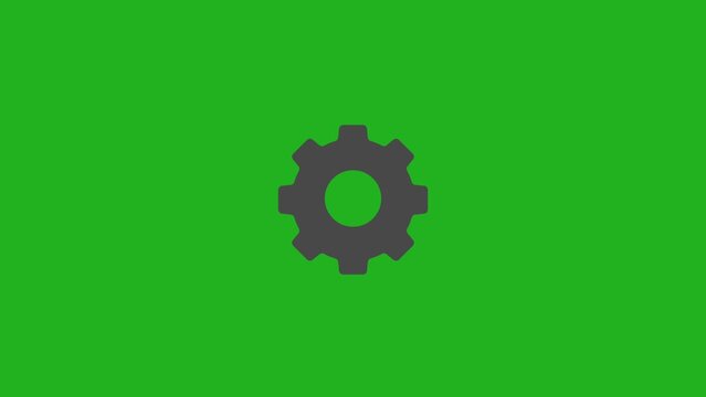 Rotating spur gear in slow motion on green screen background