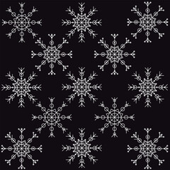 Vector drawing of Christmas snowflakes on a black background.