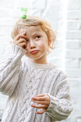 Pouty lips in action as the little one playfully inflates them.