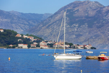 Fototapeta na wymiar Kotor, Montenegro boats and high mountains