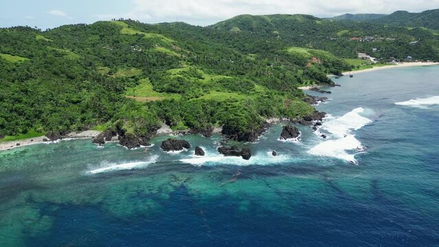 Turquoise Seascape And Green Hills In Baras, Catanduanes, Philippines - aerial drone shot