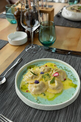 Ravioli served on a fancy restaurant table