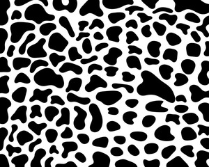 Abstract animal skin leopard, cheetah and jaguar seamless pattern design. Black and white seamless camouflage background.