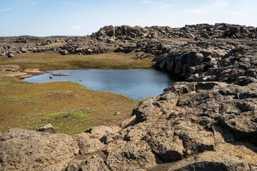 Foto op Aluminium The Rugged Landscape of the Hafragilsfoss Waterfall at Vatnajokull National Park © Zack Frank