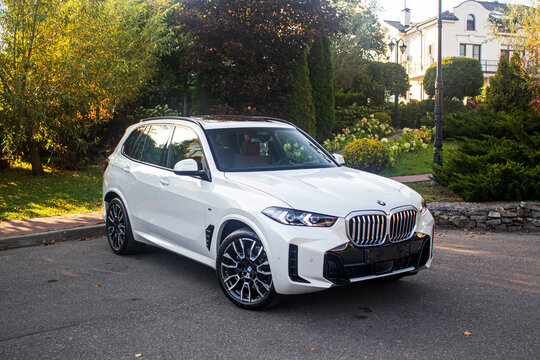 car on the road BMW X5 G05 2023