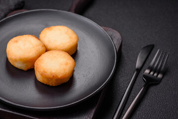 Delicious fresh sweet cheese pancakes with raisins and cinnamon