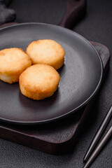 Delicious fresh sweet cheese pancakes with raisins and cinnamon