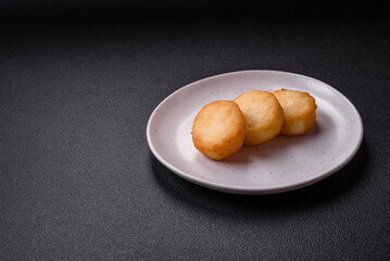 Delicious fresh sweet cheese pancakes with raisins and cinnamon