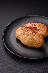 Delicious fried cutlets or meatballs with salt, spices and herbs