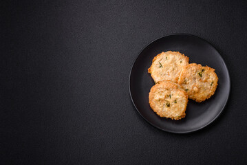 Delicious fried minced fish cutlets or meatballs with salt, spices and herbs