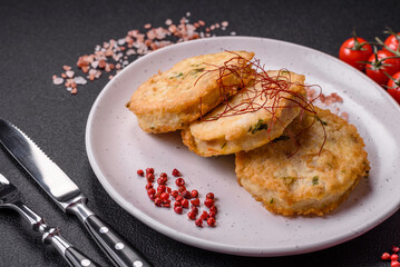Delicious fried minced fish cutlets or meatballs with salt, spices and herbs