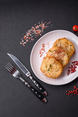 Delicious fried minced fish cutlets or meatballs with salt, spices and herbs
