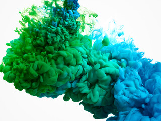 Abstract background of green and blue paint in water isolated