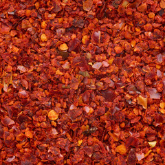 Crushed red pepper heap texture background