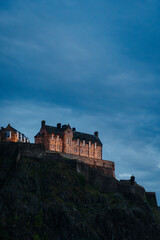 Fototapeta na wymiar Edinburgh Castle at Night - Medieval Fortress Nestled in Scenic Cityscape with Panoramic Skyline