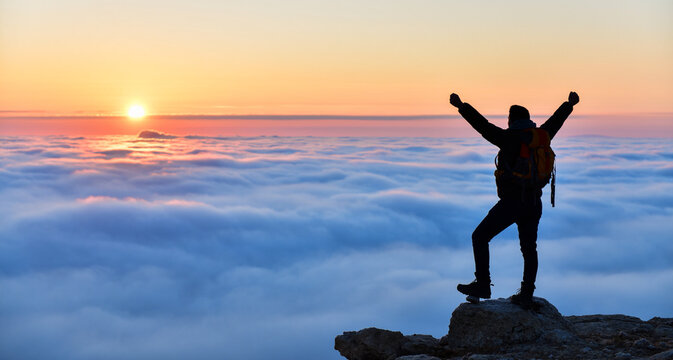 Young Man Watching the Sunset