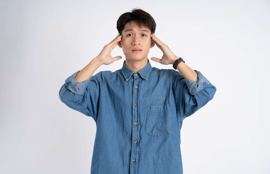 Portrait of Asian male  posing on white background