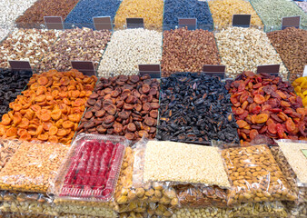dried fruits and nuts on the market counter