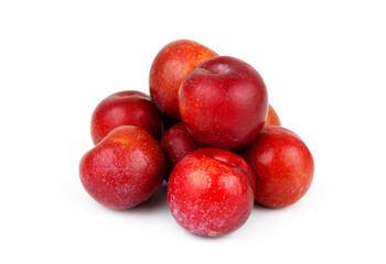 Fototapeta na wymiar Red plums isolated on white background