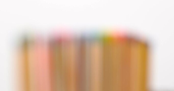 Still shot of colored matchsticks, with shallow depth of field and focus transition