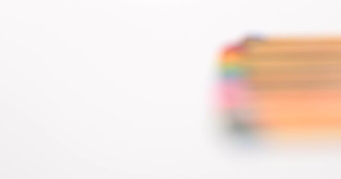 Still shot of colored matchsticks, with shallow depth of field and focus transition
