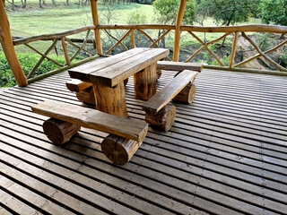 the observation terrace is a haven for game watchers in the reserve. a cozy pergola made of roughly...