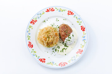 cutlet with mashed potato on the white