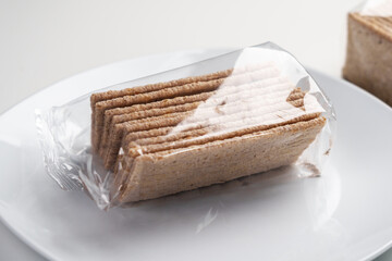 Dietary crispbreads in transparent cellophane packaging. New healthy nutritious product