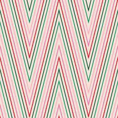 Chevron pattern. Retro vintage style zigzag stripes seamless background. Vector colorful ornament with diagonal lines, zig zag. Simple abstract geometric design in green, pink, red, beige colors