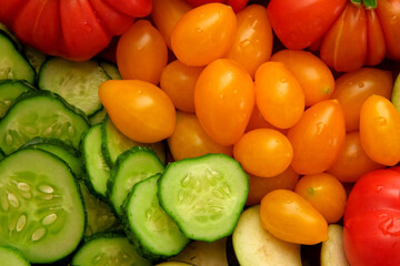 Mixed fresh vegetable background. Healthy eating ingredients. Slice of mix veggies, tomatoes, cucumbers, cherry tomato, eggplant. Nutrition, diet, vegan food. Assorted fruits rotating view closeup 4K