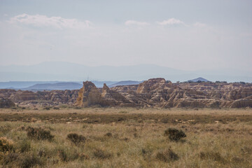 Rock formations at desert landscape of the arid plateau of the Bardenas Reales, Arguedas, Navarra, Spain