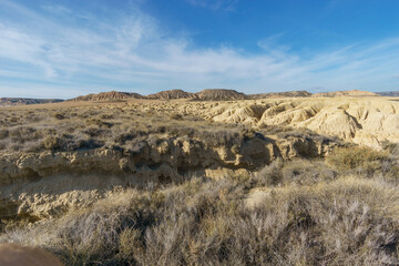 Desert landscape of the arid plateau at Barranco Grande of the Bardenas Reales, Arguedas, Navarra, Spain