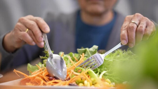 person eating salad