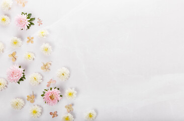 Spring frame of small flowers and aster, floral arrangement