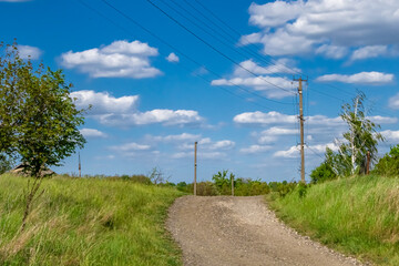 Beautiful empty asphalt road in countryside on colored background