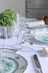 table set with crystal glasses, table set in the restaurant, table set for dinner, glass of champagne, table set, glass of champagne on the table, close up of crystal glass
