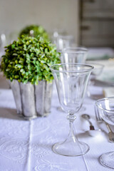 table set with crystal glasses, table set in the restaurant, table set for dinner, glass of champagne, table set, glass of champagne on the table, close up of crystal glass