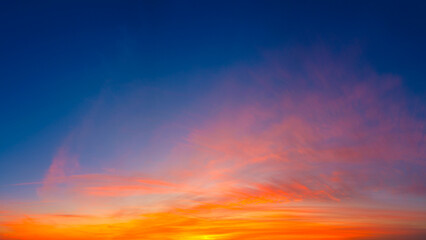 Sky with clouds during sunset. Clouds and blue sky. A high resolution photograph. Panoramic photo for design and background.